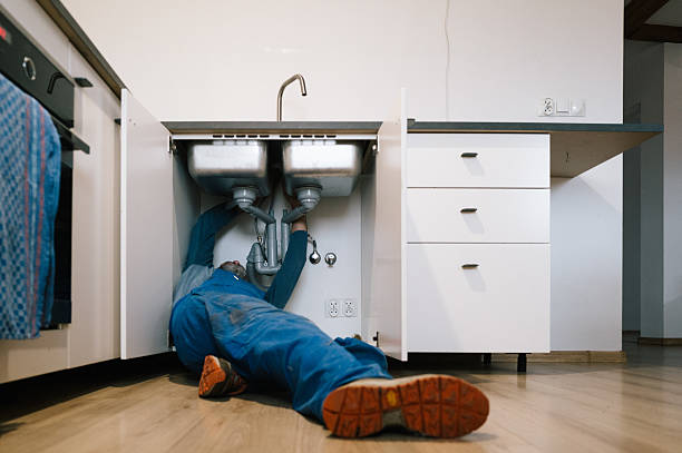 Professional Emergency Plumber technician working in Harmony, PA